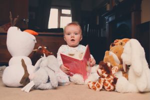 molly reading to her teddies