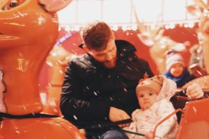 Molly and Daddy on the reindeer ride