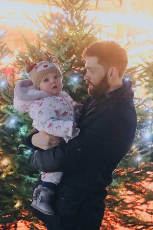 Molly and daddy in the Christmas tree maze