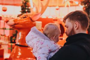 Molly and Daddy on the reindeer ride